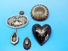 Two tortoiseshell brooches,