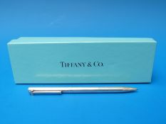 A white metal Tiffany and Co ballpoint pen in original sleeve and box (pen marked 925)
