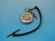 A continental half hunter pocket watch with enamel numerals,