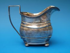 A silver milk jug (Chester 1913,
