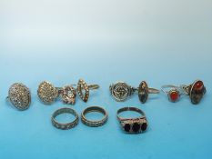 Eleven silver/ white metal rings to include one set with moss agate maker Iona,
