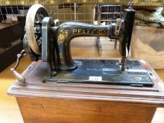 A vintage Pfaff sewing machine in case