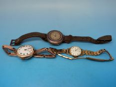 A 9ct gold watch with enamel face,