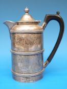 A Carrington & Co. 130 Regent Street, London hallmarked silver hot water jug, height 19.