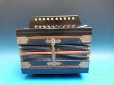 A German c1910 melodeon with two spoon base together with an Irish folk music bodrun drum