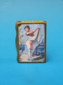 An enamel erotic vesta with scene of lady in her bedroom to front,