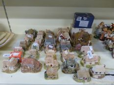 A collection of Lilliput Lane Cottages,