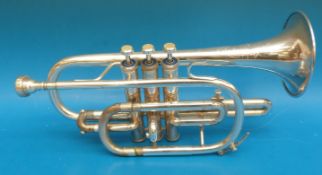 A cased silver plated cornet by Corton, reg no 743501,