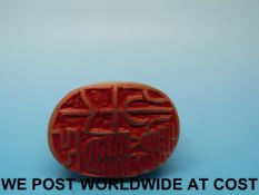 A Chinese soapstone seal with carved deer to the top (5cm tall)