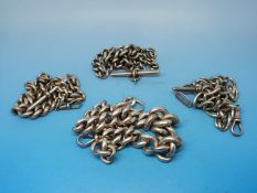 Four silver Albert silver chains including one with a 'stirrup' fob