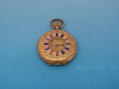 A continental ladies' yellow metal fob watch marked 18k with all over etched decoration,