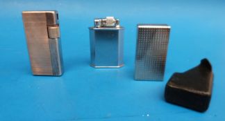 A vintage McMurdo lighter together with two vintage Flaminaire examples