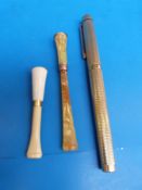 A gold plated Sheaffer pen together with two bakelite cheroot holders