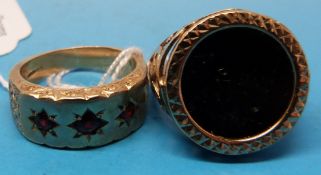 A 9ct gold ring set with three garnets together with a yellow metal ring
