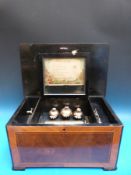 A late 1880-1890 cylinder music box playing eight airs on comb and three tuned bells with butterfly