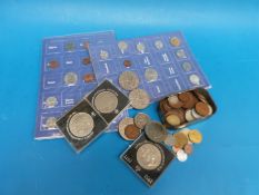A quantity of pre-decimal UK and world coinage (very small silver content) together with modern