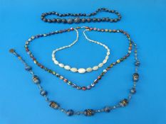 Two necklaces of millefiori glass beads and a shell necklace