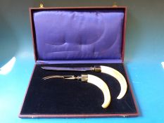A ram's horn handled carving set by Geo Wostenholm & Sons,