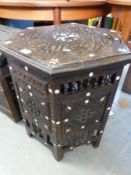An Eastern hexagonal table with mother of pearl inlay (W51 x H62cm)