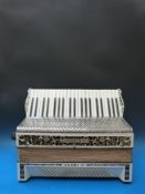 A Honner 120 brass Verdi III c1930s piano accordion in ivory coloured finish,