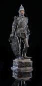 A German white metal and ivory figure of a knight by Berthold Hermann Muller of Hanau in the form