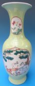 A 19thC Chinese baluster vase with flared lip decorated with four panels,