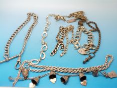 A hallmarked silver albert, four silver bracelets, silver rope twist necklace,