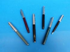 Six vintage pens (five Parker and a Sheaffer)