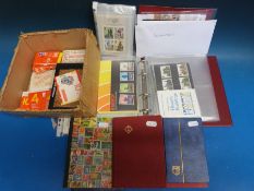 A box of GB presentation packs, PHQ cards,