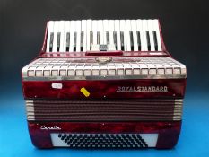 A 1980 Royal Standard Capella 80 bass piano accordion in red pearloid finish,