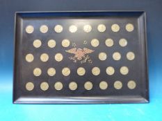 A Couroc of Monterey tray inset with USA Presidential medallion coins up to 1969