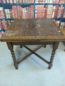 An oak extending dining table,