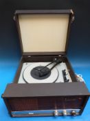 A Dansette Conquest record player with Garrard deck together with a Tonesta example by Oxford,