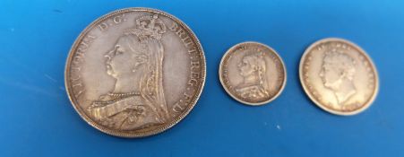A Queen Victoria 1887 Jubilee crown together with a sixpence of the same vintage and a George IV