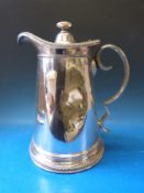 A large possibly regimental military jug with gadrooned edge, height 28.