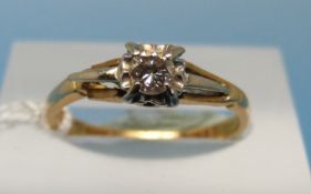 An 18ct gold ring set with a round brilliant cut diamond (size L)