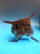 A Westminster chiming mantel clock and a drum clock together with a clock movement