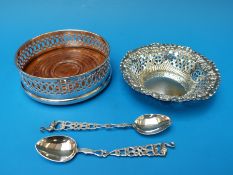 A silver plated coaster,