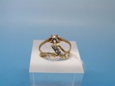 Two 18ct gold rings, one set with three diamonds (size F),