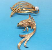 A hallmarked 9ct gold brooch in the form of a fish with a ruby eye and a 9ct gold brooch set with a