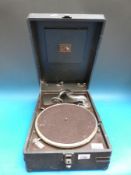 A vintage His Master's Voice portable wind up gramophone