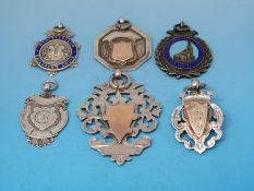 Six silver watch fobs including Elsteddfod and enamelled examples