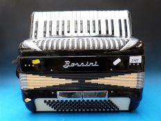 A C1980 Borsini 96 bass piano accordion with five treble couplers and two bass couplers in black