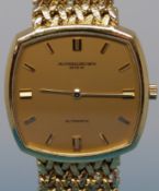 An 18ct gold Vacheron & Constantin automatic gentleman's wristwatch on 18ct gold strap with paper