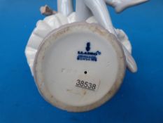 A Lladro figure 'Julia' of a seated ballerina