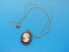 A cameo pendant with 9ct gold mount on 9ct gold chain