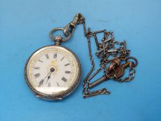 A ladies' continental silver fob watch in chased case,
