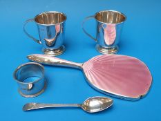 A pair of hallmarked silver christening mugs,