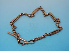 A yellow metal Albert with unusual elongated links marked 9ct gold (18.