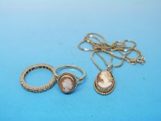 A 9ct gold chain, a cameo pendant with yellow metal surround,